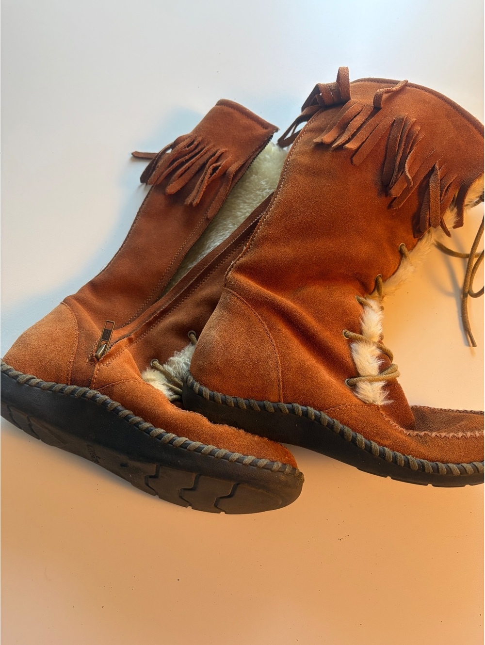 Minnetonka Leather Fringe Winter Boots with Faux Fur Lining